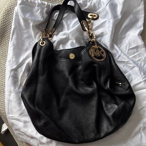 Michael Kors Black Hobo Bag with Gold Accents